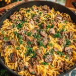 One-Pot Ground Beef Stroganoff served with noodles in a creamy sauce