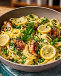 Delicious Chicken and Lemon Pasta garnished with herbs