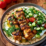 Delicious homemade Chicken Shawarma served with fresh vegetables and sauces.