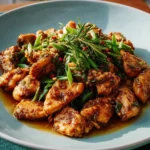 Delicious easy chili garlic chicken served with rice and vegetables