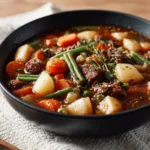 Bowl of Vegetable Beef Soup with fresh vegetables and tender beef