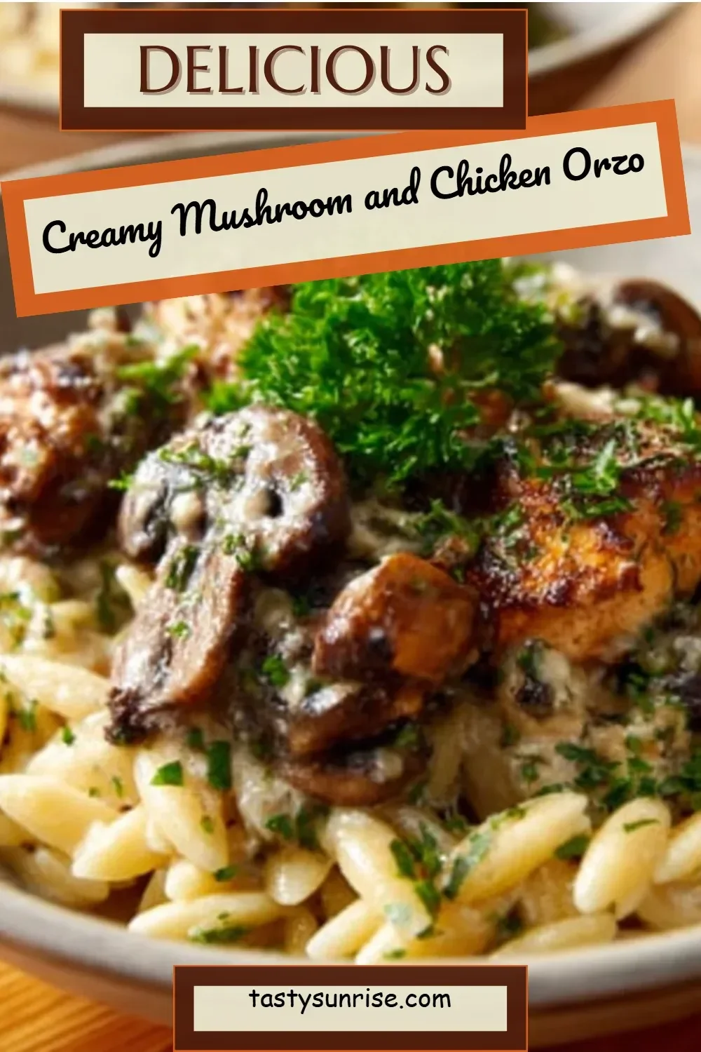 Creamy mushroom and chicken orzo dish garnished with parsley