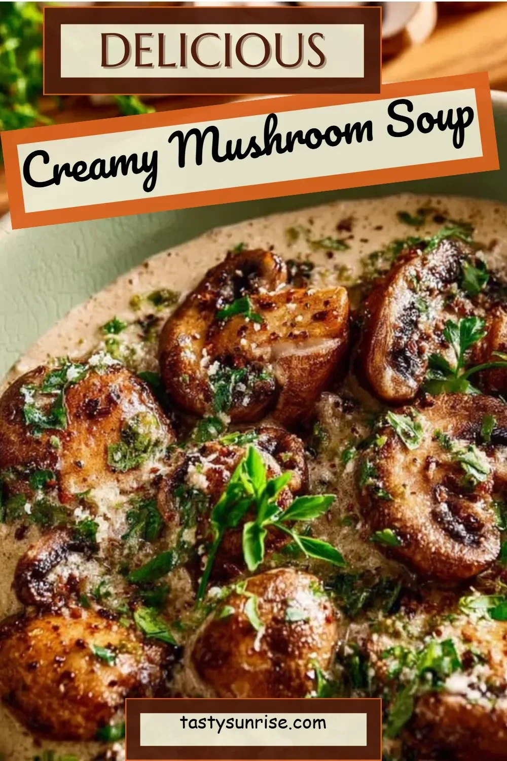 Bowl of creamy mushroom soup garnished with herbs and served with crusty bread