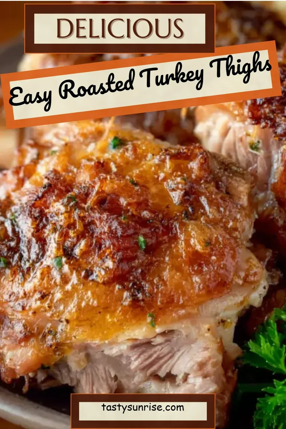 Juicy roasted turkey thighs garnished with herbs on a serving platter