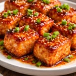 Delicious Bang Bang Salmon Bites served with dipping sauce
