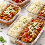 Meal prep unstuffed pepper bowls filled with colorful vegetables and grains.