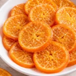 Homemade easy candied orange slices on a plate
