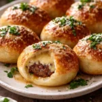 Garlic Parmesan Cheeseburger Bombs stuffed with cheese and herbs