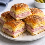 Delicious ham and swiss sliders served on a platter