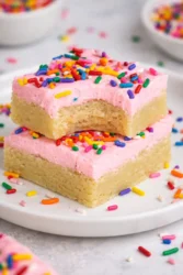 Delicious homemade sugar cookie bars with colorful sprinkles on top