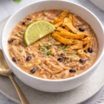 Delicious bowl of white chicken chili with cream cheese topping