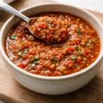Bowl of fresh and vibrant easy salsa made with tomatoes and herbs