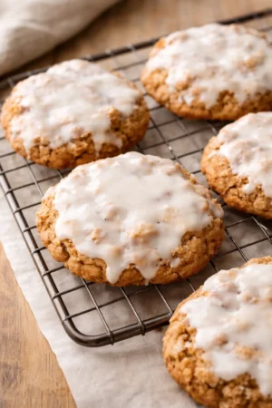 Delicious iced oatmeal cookies topped with creamy frosting