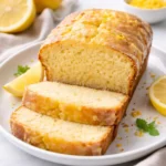 Slice of lemon sourdough discard cake on a plate