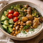 Colorful plant-based Mediterranean bowls with fresh vegetables and grains