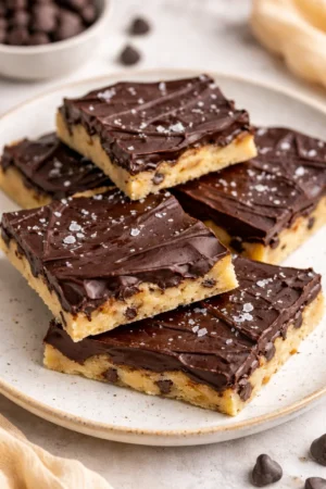 4 Ingredient Cookie Dough Bark on a plate with chocolate drizzle