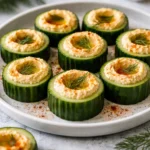 Cucumber Hummus Bites served on a platter with fresh ingredients