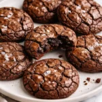 Gourmet brownie cookies on a plate with chocolate chunks