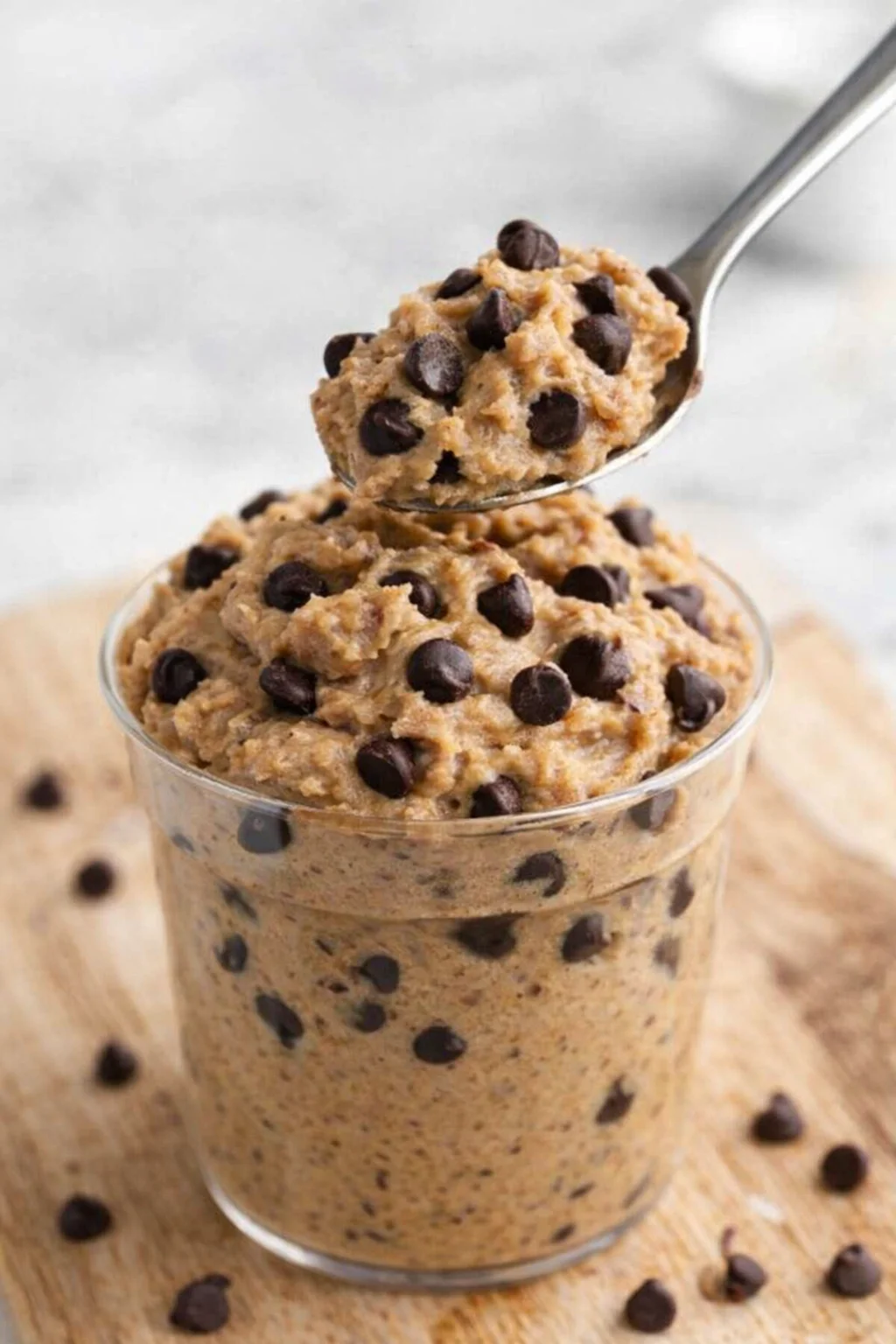 Bowl of protein cookie dough ready to be enjoyed as a healthy treat.