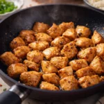 Delicious garlic chicken with a rich butter and garlic sauce served on a plate.